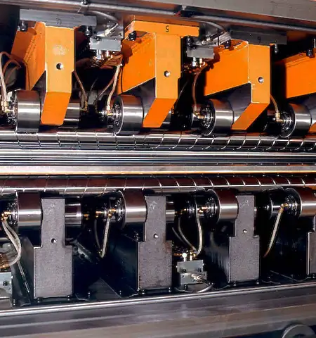 Close-up of cassette leveler rollers used for precision metal straightening