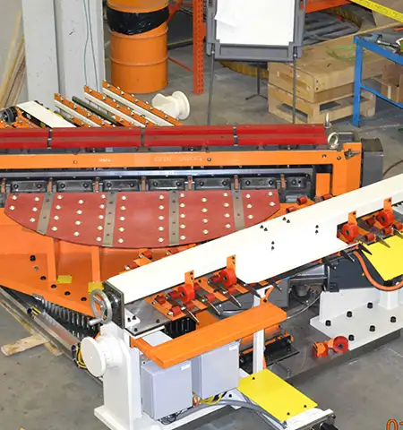 Die handling and transfer system with rollers and positioning components for stamping operations