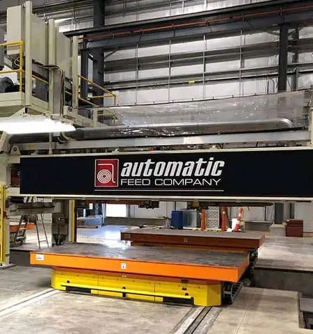 Automated metal sheet stacker system with conveyor and lifting platform